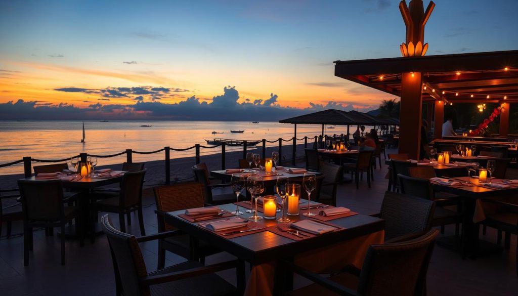 A beach restaurant in Pattaya with tables set for dinner, ocean view visible A beach restaurant in Pattaya with tables set for dinner, ocean view visible