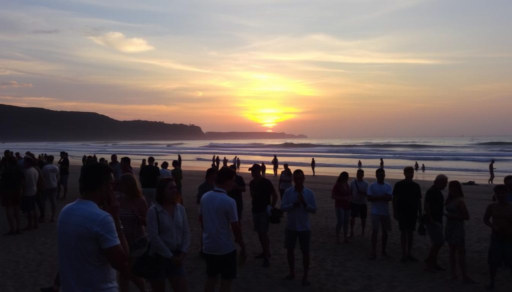 Kuta beach sunset with people socializing, popular for meeting people in bali